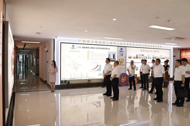 1779757921208704.png 旅行二建公司建设60周年展.PNG